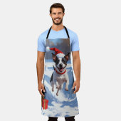 Rattenterriër loopt in de sneeuw met kerst Pet Schort (Gedragen)