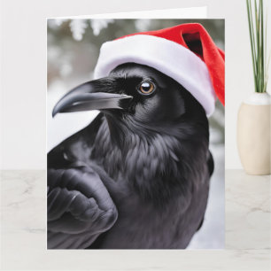 Raven in een kerstmuts kaart