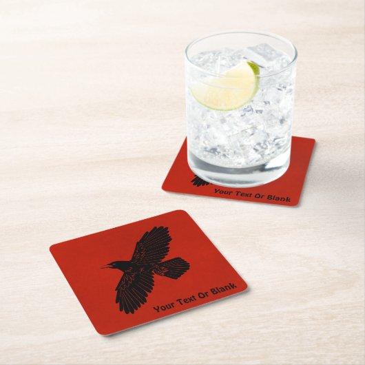 Raven op rood kartonnen onderzetters (Insitu)