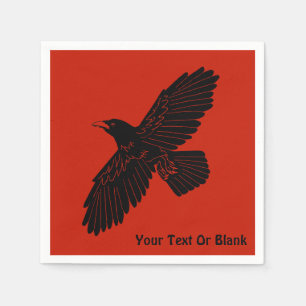 Raven op rood servet