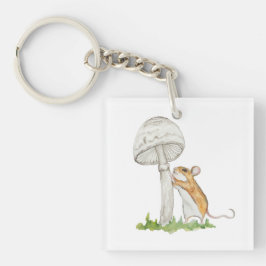 Realistisch een grappige veldmuis en paddenstoel sleutelhanger