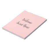 Realtor welkome huisverwarming voegt jouw naam toe notitieblok (Linkerzijde)