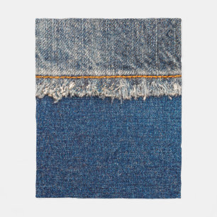 Rechte naad met oranje draad op gebleekte hol fleece deken