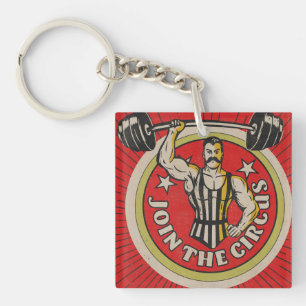 Reclame voor oude circus-krachtpatsers sleutelhanger