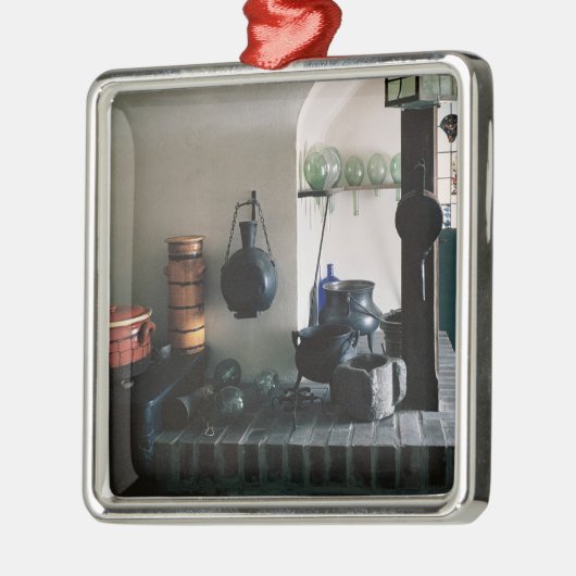 Reconstructie van een apotheek metalen ornament (Links)