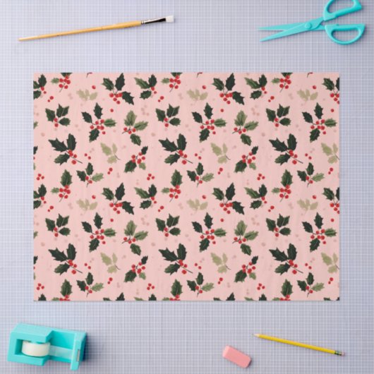 Red berries and holly on pink tissuepapier (Craft)