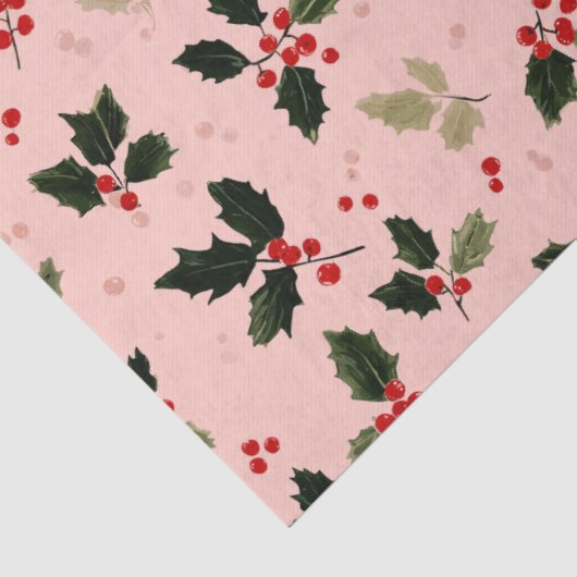 Red berries and holly on pink tissuepapier (Detail)
