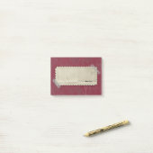 Red Burgandy Flowers met etiket met taped Post-it® Notes (Op bureau)