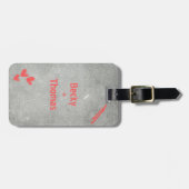 Red graffiti name on gray concrete, your  bagagelabel (Voorkant horizontaal)