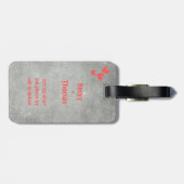 Red graffiti name on gray concrete, your  bagagelabel (Achterkant horizontaal)