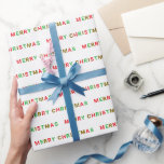 Red Green Merry Christmas Typografie Cadeaupapier<br><div class="desc">Wikkel je cadeaus in feestelijke juichen met ons levendige kerstinpakpapier! Met een speels patroon van "Vrolijk Kerstfeest" groeten in kleurrijke rode, groene en gouden letters, brengt dit papier vakantiedruk naar elk cadeau. Het levendige ontwerp voegt een leuke maar elegante touch toe, perfect om uw geschenken onder de boom te laten...</div>