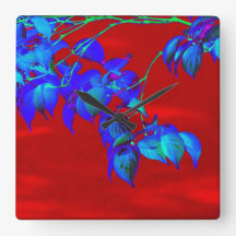 Red Sky Blue Leaves Wall Clock