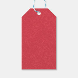 Red textured surface with subtle swirling pattern cadeaulabel