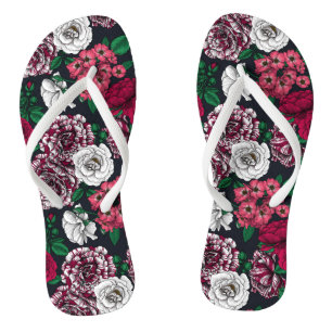 Red, white and bi-color roses with green leaves on teenslippers