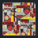 Red Yellow Art Deco Glas in lood Vierkante Klok<br><div class="desc">Deze muurklok heeft een vierkant kunstdecopatroon in digitaal gekleurd glas. Een kleurrijk geometrisch ontwerp in kleuren van rood,  geel en zwart,  ideaal voor een pop kleur in uw thuisdecor. Je kunt het patroon op deze klok groter of kleiner maken.</div>