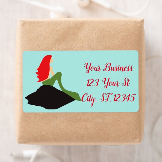 Redhead Mermaid Sitting Thunder_Cove Etiket (Insitu)