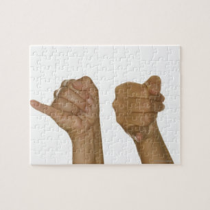 Reeks handen die J-teken maken Legpuzzel