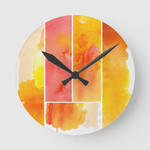 Reeks met de hand geschilde abstracte waterverf ronde klok