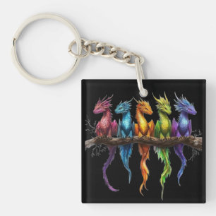Regenboog groep baby draken op zwart sleutelhanger