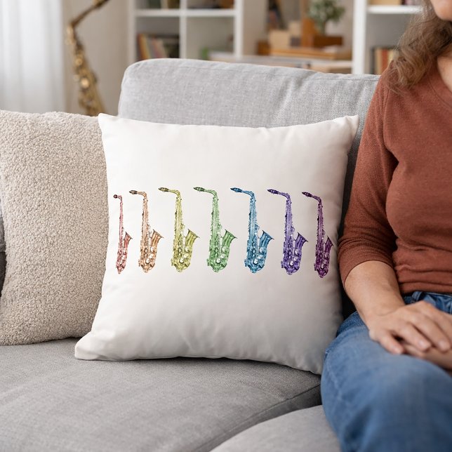 Regenboog Saxofoons Muziek Kussen (A throw pillow with saxophones in red, orange, green, yellow, purple, blue & pink.)