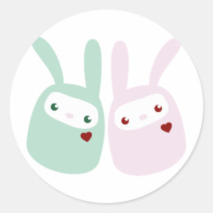 Regenbooggekleurde reuzenbunnies ronde sticker