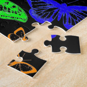 Regenbooggekleurde vlinders vliegen legpuzzel (Zijkant)