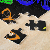 Regenbooggekleurde vlinders vliegen legpuzzel (Zijkant)