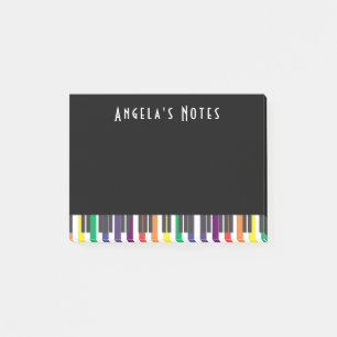 Regenboogpianotoetsen op zwart post-it® notes
