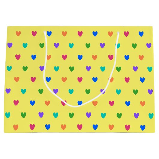 Regenboogpolka harten op geel groot cadeauzakje (Voorkant)