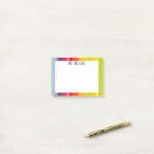 Regenboogstrips met meerdere kleuren post-it® notes (Op bureau)