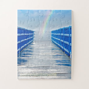 regenbooguiteinde op natte pier legpuzzel