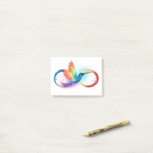 Regenboogvogel met oneindige symbolen post-it® notes (Op bureau)