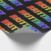 Regenboogvoornaam "BRITTNEY"; vun en kleurrijk Cadeaupapier (Hoek)
