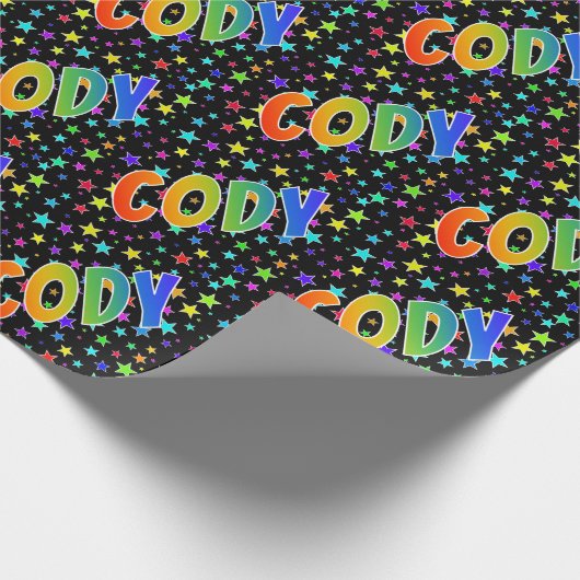 Regenboogvoornaam "CODY" + sterren Cadeaupapier (Hoek)