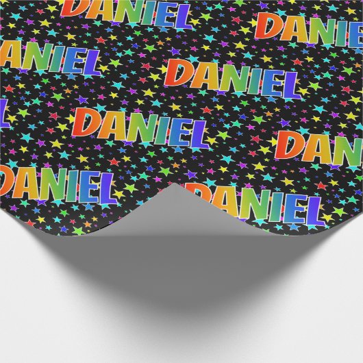 Regenboogvoornaam "DANIEL" + sterren Cadeaupapier (Hoek)