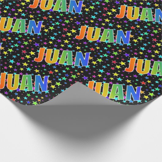 Regenboogvoornaam "JUAN" + sterren Cadeaupapier (Hoek)