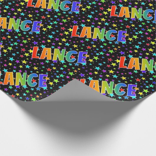 Regenboogvoornaam "LANCE" + sterren Cadeaupapier (Hoek)