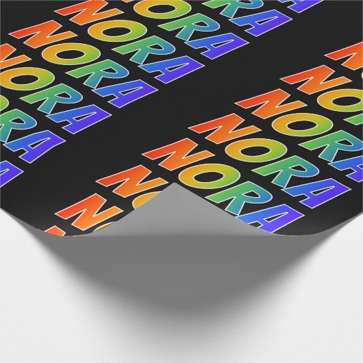 Regenboogvoornaam "NORA"; vun en kleurrijk Cadeaupapier (Hoek)