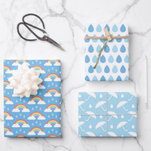 Regenboogwolken, regendruppels en paraplu's inpakpapier vel