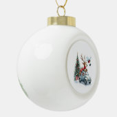 Reindedarm die een kever bestuurt met kerst treeb keramische bal ornament (Links)