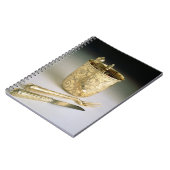 Reisset van een mes, vork, lepel en bekerglas notitieboek (Linkerzijde)