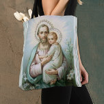 Religieuze St. Joseph met Child Jesus Tote Bag<br><div class="desc">Prachtige ,  traditionele katholieke afbeelding van St. Joseph die het kind Jezus vasthoudt. Een kruis is in zijn handen en leugens aan beide zijden.</div>