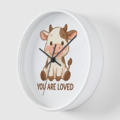 Reloj de pared con vaquita kawaii y frase "You Are (Hoek)