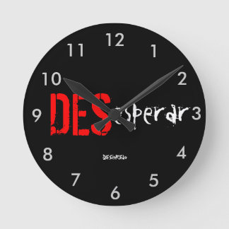 Reloj de pared DESesperar DESenREdo negro Ronde Klok