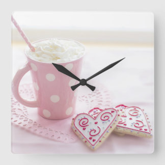 reloj de pared rosado vierkante klok