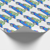 rendier in auto met kerstboom cadeaupapier (Hoek)