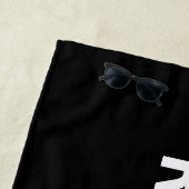 RESERVED, witte tekst op zwarte handdoek (In situ)