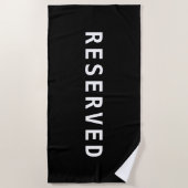 RESERVED, witte tekst op zwarte handdoek (Voorkant)