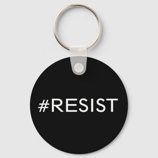 #Resist, witte tekst op zwarte sleutelhanger (Voorkant)