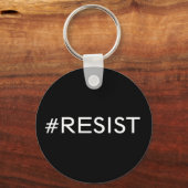 #Resist, witte tekst op zwarte sleutelhanger (Voorkant)